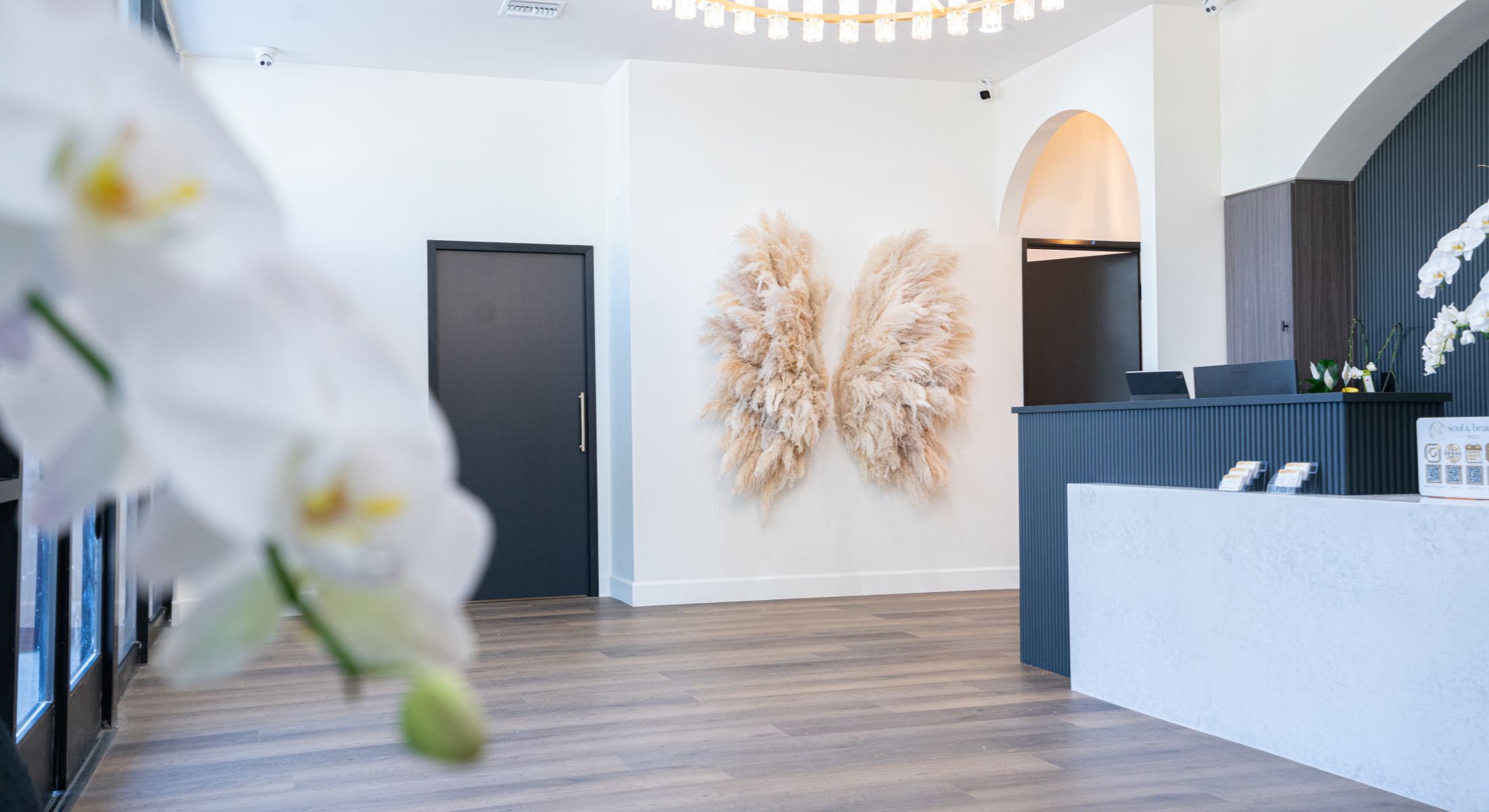 Modern reception area with decorative wall art.